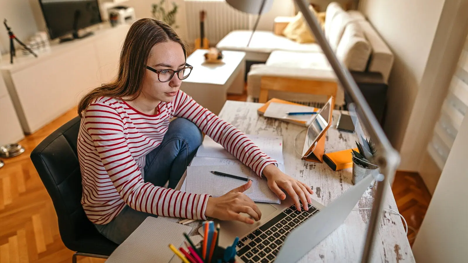 woman studying on her laptop