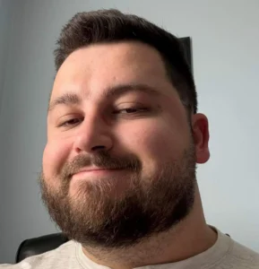 Smiling photo of teacher Jed Basler