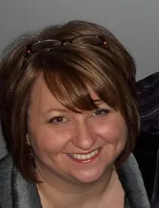 Smiling photo of teacher Sunny Enoch.